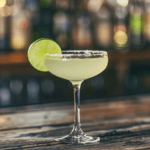 a margarita sitting on top of a wooden table